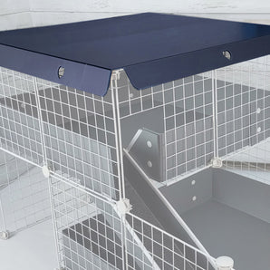 wide navy canopy atop a loft on a silver c&c guinea pig cage