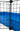 Cable tied Black door grid attached to a blue C&C guinea pig cage