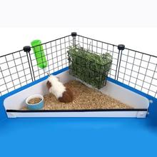 White corner kitchen in a light blue C&C guinea pig cage