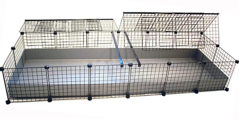 Opened jumbo silver covered C&C guinea pig cage with black grids and connectors
