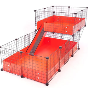 Orange c&c guinea pig cage with an offset wide loft