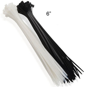 Bundles of 6 inch long black and white cable ties