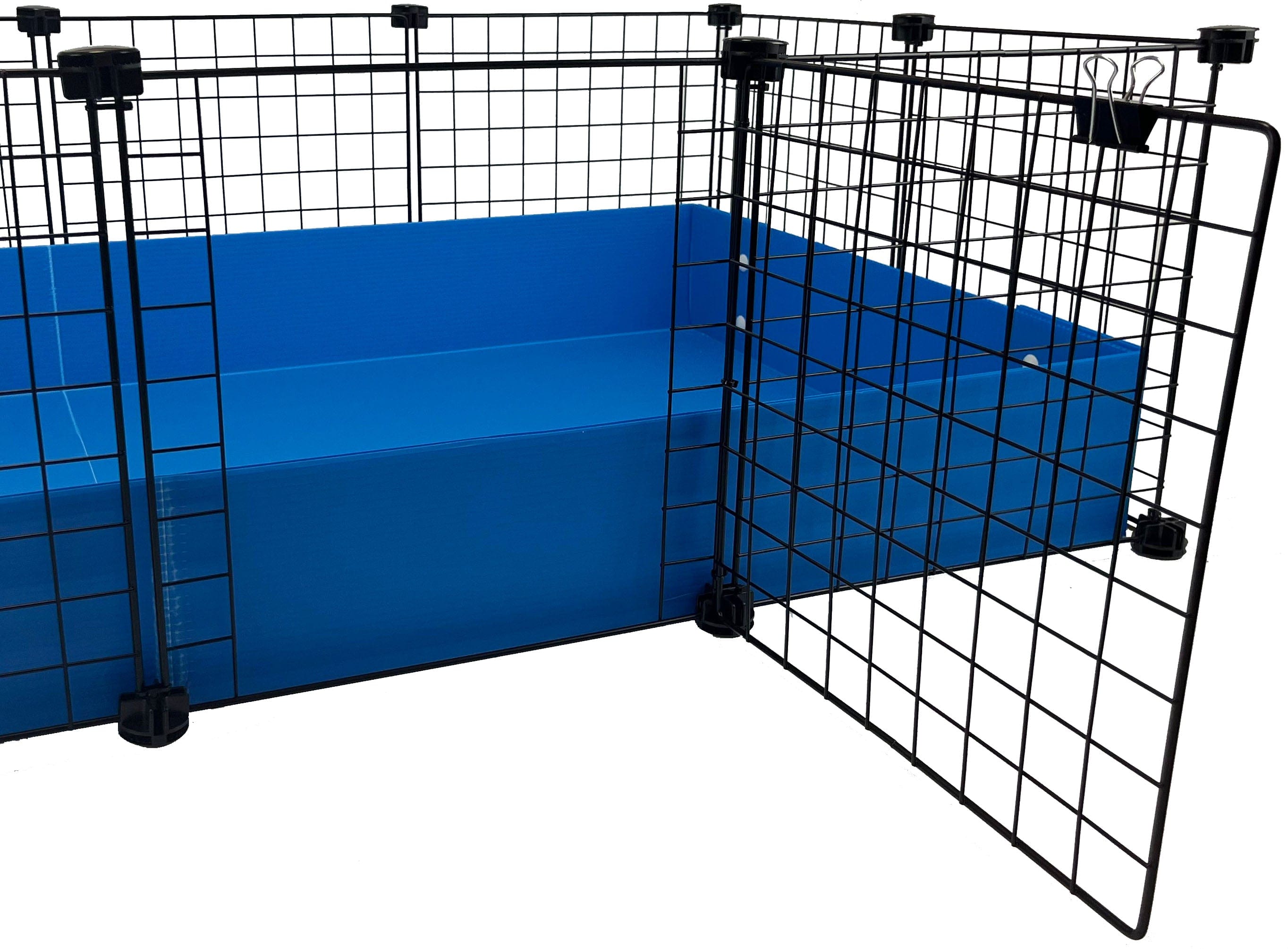 Black door grid attached to a blue C&C guinea pig cage
