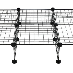 Black grids and half grids with connectors making a stand for a C&C guinea pig cage