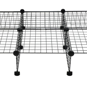 Black grids and half grids with connectors making a stand for a C&C guinea pig cage